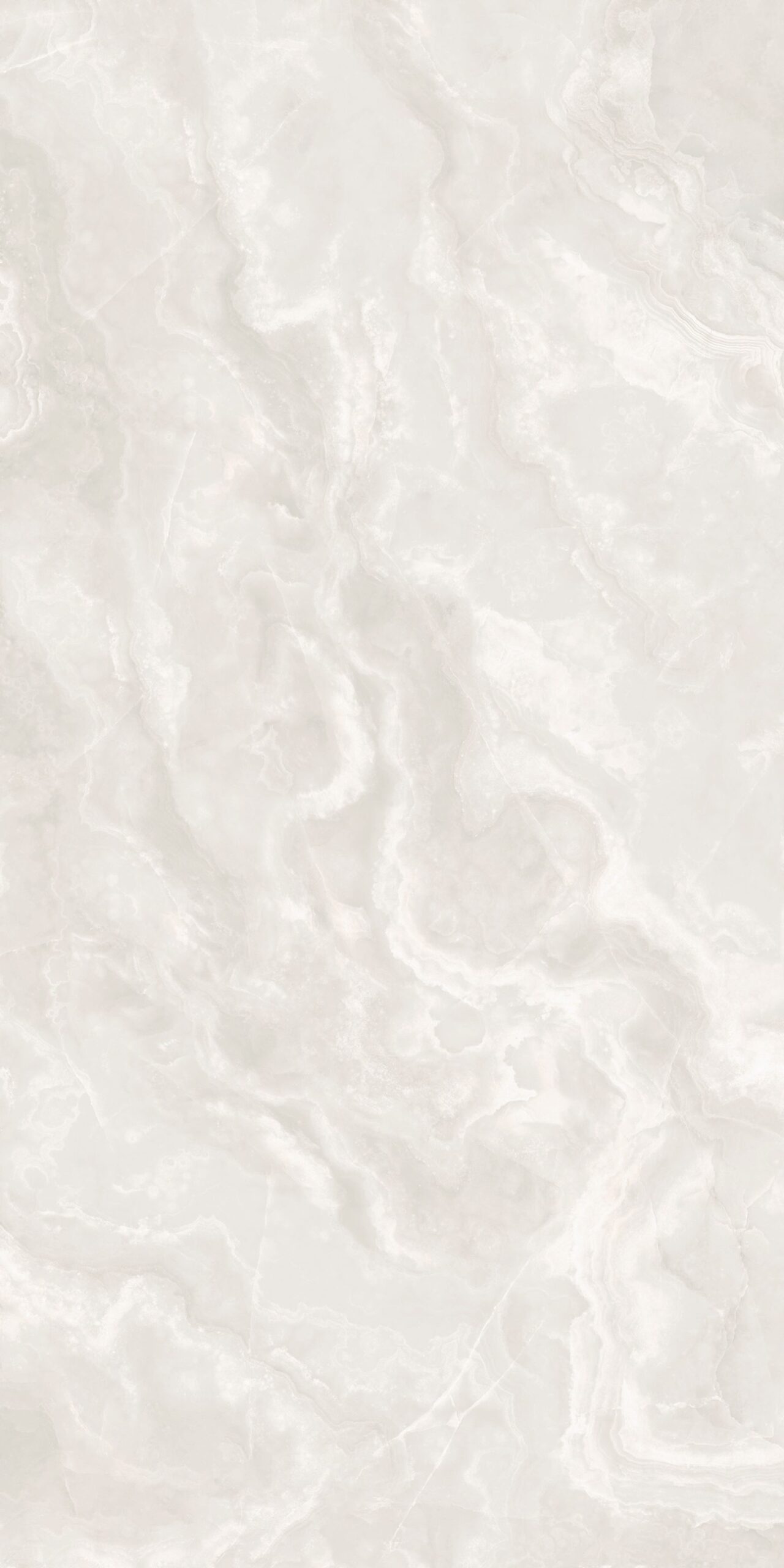 שיש אוניקס לבן (Onyx Bianco) — אבן טבעית חצי-שקופה מתאימה לחיפוי ולאלמנטים דקורטיביים